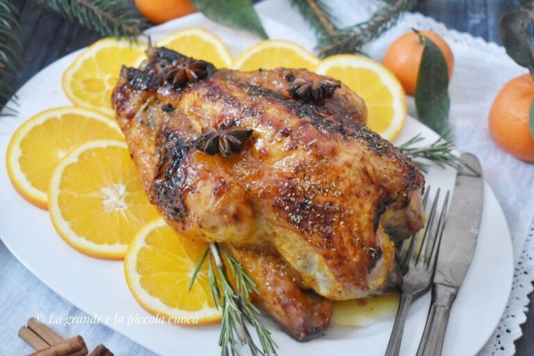 Pieczona perliczka w pomaranczach